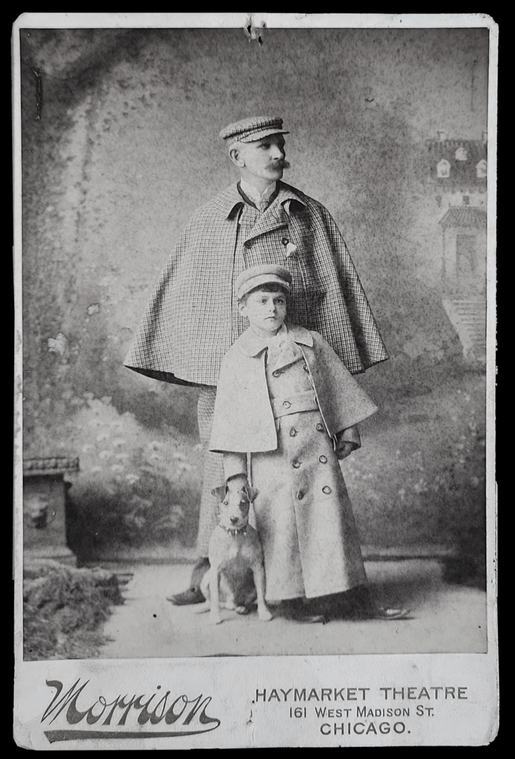 Will J. Davis with son Willie J. Davis wearing plaid capes studio portrait